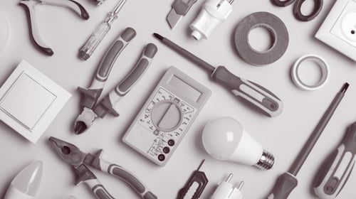 Flat lay composition with electrician's tools on color background.