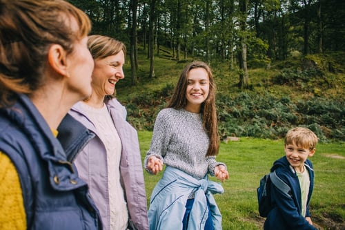 Family going on a walk together, blogpost about bridging social disconnect through an app focused on bringing families together called 