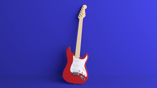Electric guitar against a blue wall. Blogpost about Intrapreneurship examples.