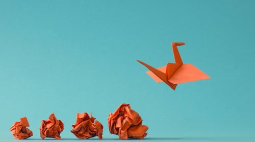 Formation of origami birds, representing creativity and innovation in a blogpost about the Chief Innovation Officer's role in spearheading innovation.