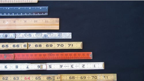 Rulers and scales in metric and inches represent measurement, accuracy and results with copy space.