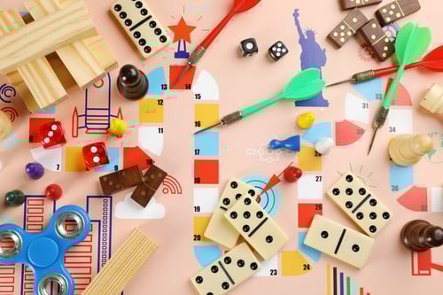 Different types of board games and its' components as background, top view. Blogpost about Gamification.