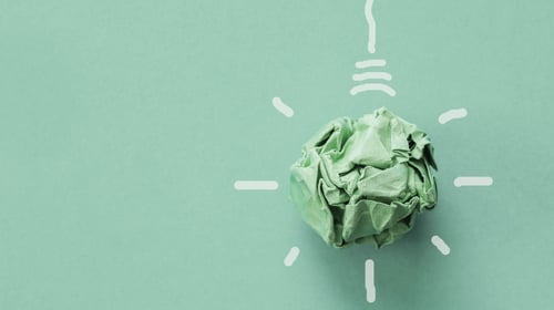 Green paper light bulb.
