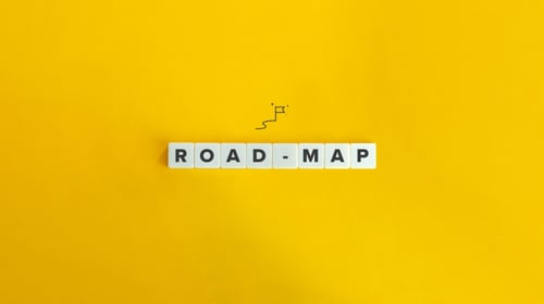 Road-map Banner. Letter Tiles on Yellow Background.