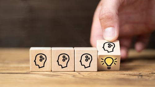 blocks that depict people thinking and uncovering ideas. Blogpost about idea management and implementation.