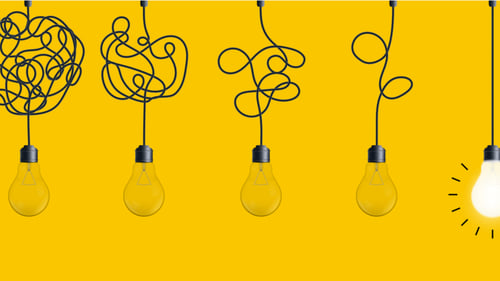 Lightbulbs on yellow background, Blogpost about Idea management and employee engagement are driving forces behind a successful business.