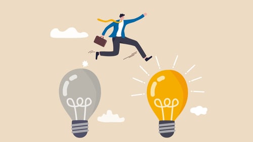 The stages of innovation represented by a man jumping from one light bulb to another.