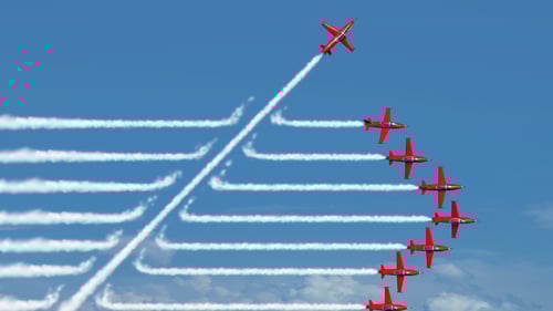 Fighter jets flying in a row. Blogpost about convincing upper management of the need to innovate.